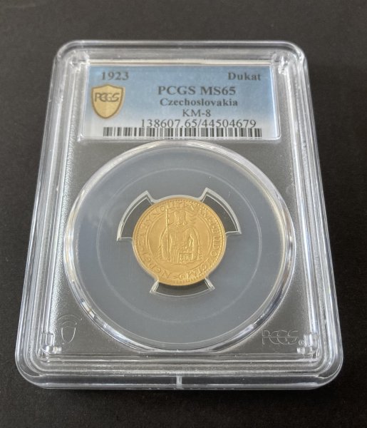 Svatováclavský dukát 1923 ČSR PCGS MS65, KM#8 Au.986 3,491g, 19,75/0,7mm raženo 61861kusů vysoké hodnocení