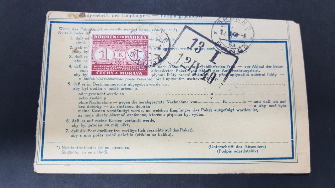PD1- známka potravní daně na zadní straně části balíkové průvodky ze Štěpánova u Olomouce, datum 11.9.1940, příchozí Brno 2, datum 12.9.1940