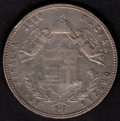 1869 G.Y.F. 1 Forint FJI. Mincovna Karlovský Bělehrad Rumunsko, Ag.900 12,345g 29mm
